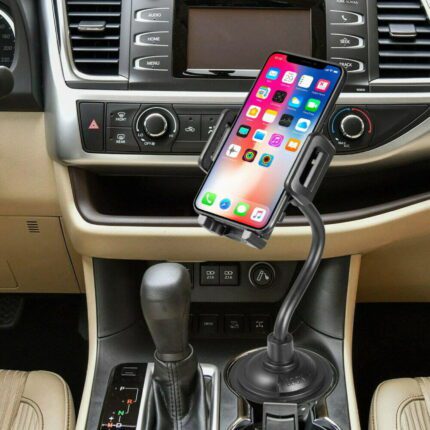 Phone mounted in car dashboard holder.
