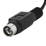 Black DIN connector with metal pins.