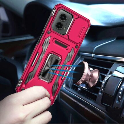 Phone with pink case near car mount.