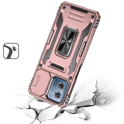 Rugged pink phone case on cracked surface.