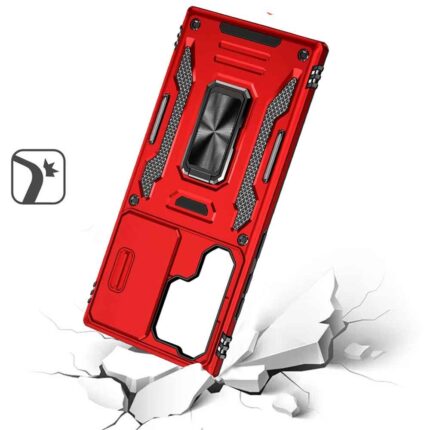 Red rugged phone case on cracked surface.