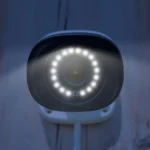 Security camera with illuminated LED lights.