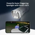 Security camera with spotlight and smartphone display.
