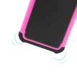 Close-up of a pink and black phone case with vibration waves.