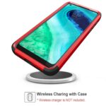 Smartphone wirelessly charging on a pad with a protective case.