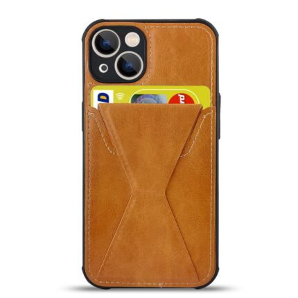 Brown leather phone case with card slots holding credit cards.