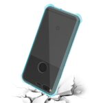 Smartphone cracked on a hard surface with a shattered screen.