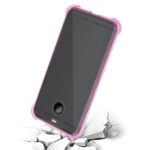 Smartphone with a pink bumper case appearing to crack the surface below.