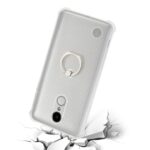 White smartphone with a ring holder on the back, shown cracked on the surface beneath.
