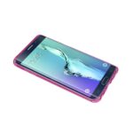 Smartphone with a pink protective case on a white background.