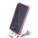 Smartphone with a pink protective case appearing to crack the surface beneath it.