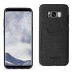 Smartphone with a black textured leather back case.