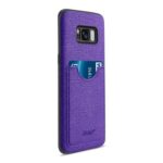 Purple phone case with a card slot holding two cards.