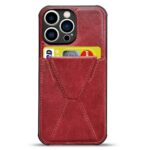 Red leather phone case with card slots holding cards.