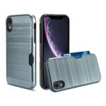 Two blue textured phone cases with card holders and an iPhone.