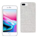 White smartphone with a textured gray fabric case beside it.