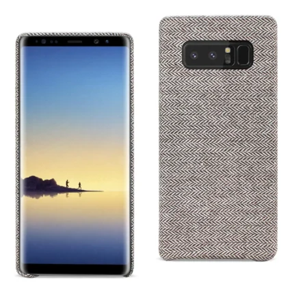 Samsung smartphone with a fabric-textured case beside it.
