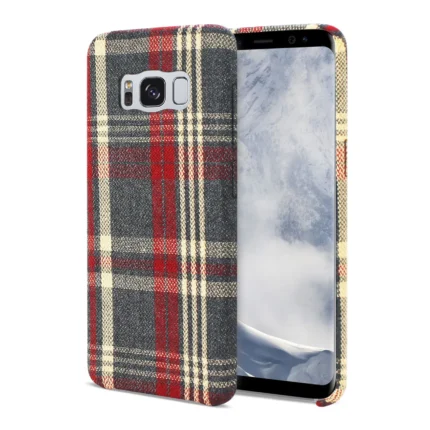 Smartphone with a red and gray plaid patterned case.