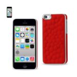 iPhone with a red textured protective case beside it.