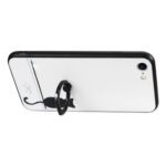 Black octopus-shaped phone stand holding a smartphone at an angle.