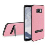 Pink phone case with built-in kickstand for hands-free use.