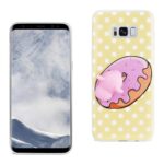 Phone with a pink donut-themed yellow polka dot case beside it.