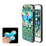 Phone case with colorful fidget spinner design and a small spinner toy.
