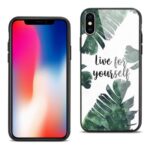 Smartphone with a tropical leaf case reading 'Live for yourself'.