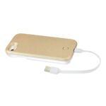 Gold-colored portable power bank with a white charging cable.