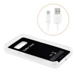 White external battery charger with USB cable included.