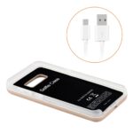 Wireless charging phone case with USB cable.