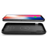Wireless charging phone case with a smartphone placed above it.