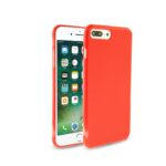 Smartphone with a red protective case beside it.