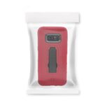 Red phone case with a black clip inside a clear plastic bag.