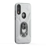 Transparent phone case with a built-in ring holder and rugged design.