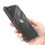 Hand holding an iPhone with a transparent protective case.