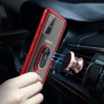 A red phone case with a magnetic ring attaches to a car vent mount.