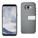 Smartphone with a rugged protective case featuring a built-in kickstand.