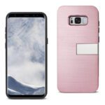 A smartphone with a pink protective case beside it.