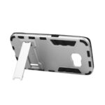 Smartphone case with built-in kickstand in silver and black.